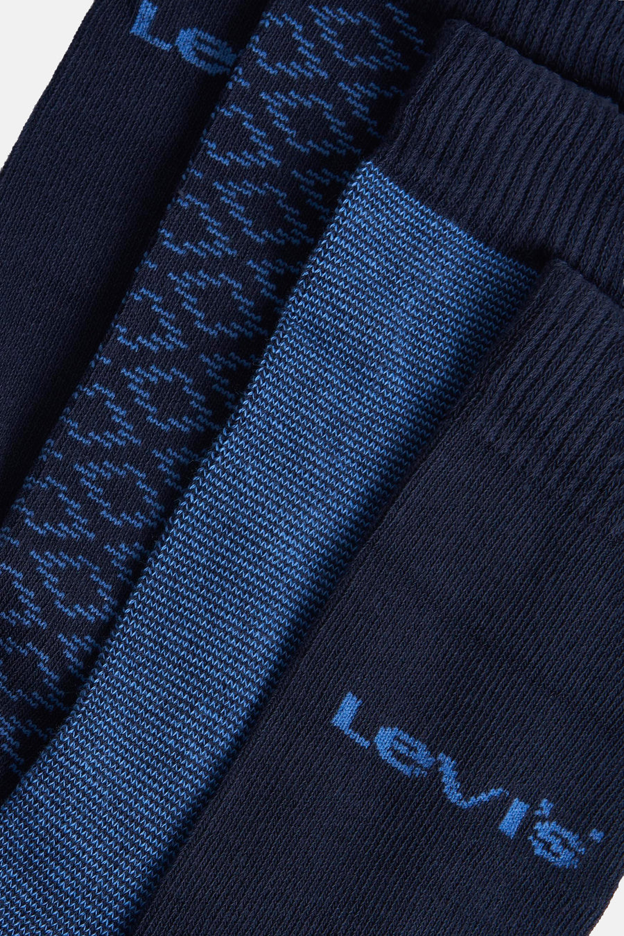 Blauwe sokken van Levi's, met contrasterende geometrische en effen patronen.