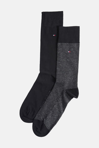 Set van zwarte sokken van TOMMY JEANS, één effen, één met een gemêleerd visgraatpatroon.