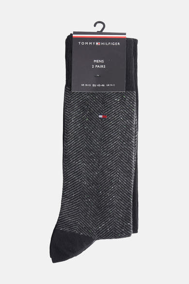 Set zwarte sokken van TOMMY JEANS met grijs chevronpatroon en kleine gekleurde stippen.
