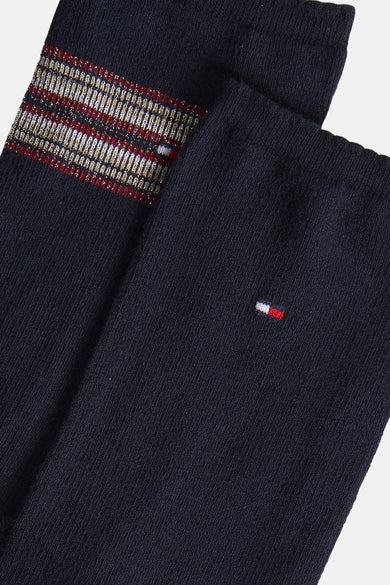 Chaussettes bleues en maille côtelée de Tommy Jeans, avec rayures décoratives métallisées et logo subtil.