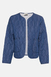 Veste en jean bleu moyen de Terra di Siena, matelassée avec motif losanges et poches plaquées.
