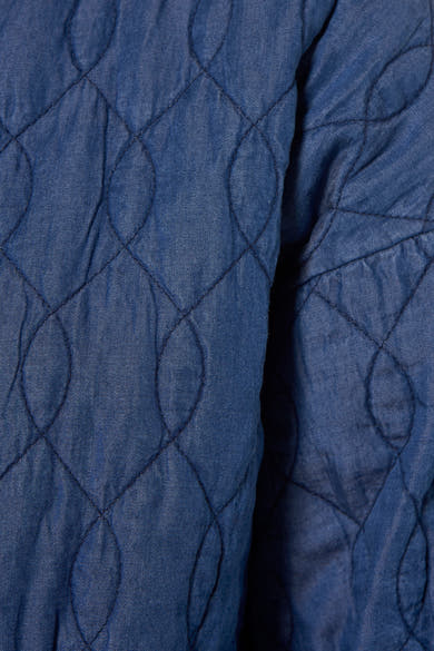 Veste en jean bleu moyen de Terra di Siena, matelassée avec motif losanges cousu et texture denim plissée.