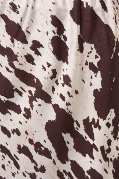 Jupe longue beige de Terra di Siena avec motif tacheté marron.
