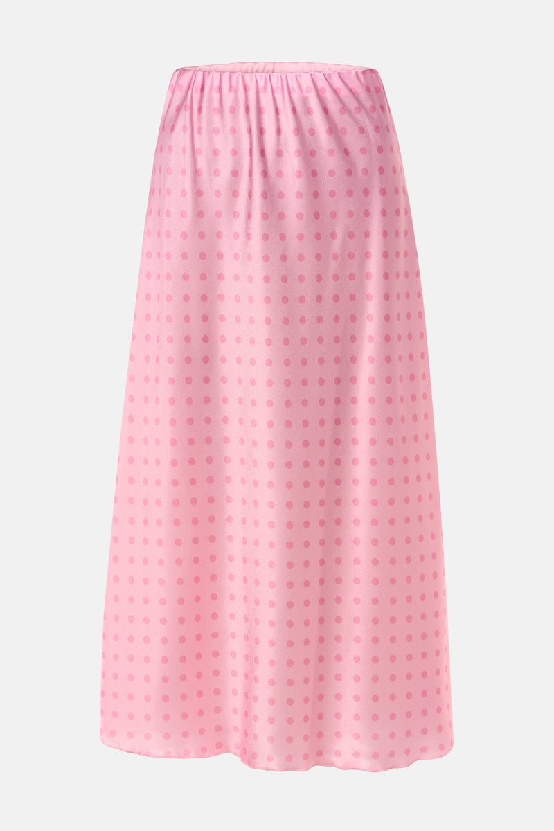 Jupe longue rose, de Terra di Siena, avec motif à pois ton sur ton.