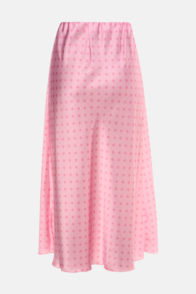 Jupe longue rose de Terra di Siena, à pois plus foncés, coupe évasée et taille élastique.