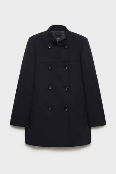 Veste longue bleue par MANGO, à double boutonnage avec six boutons, et un col montant.