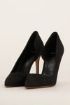 Zwarte pumps van MANGO, van achteren getoond met huidkleurige naaldhakken.