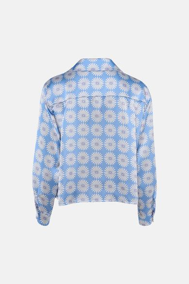 Blauwe blouse met lange mouwen van Terra di Siena, witte madeliefjesprint met roze midden, achtergezicht.