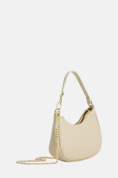 Beige schoudertas van Access® met gouden ritssluiting en schouderriem met ketting.