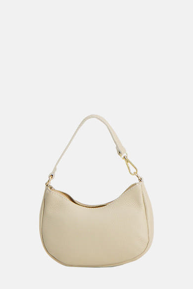 Sac à bandoulière beige de Access®, avec une bandoulière fine et une fermeture éclair dorée.
