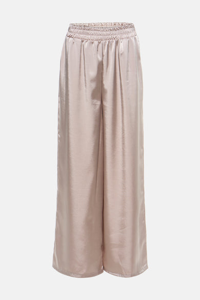 Pantalon beige en satin de Terra di Siena, coupe ample et taille élastiquée.