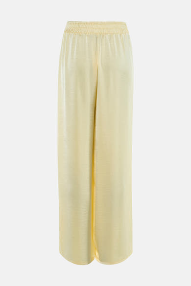 Pantalon jaune Terra di Siena avec taille élastique et texture satinée.