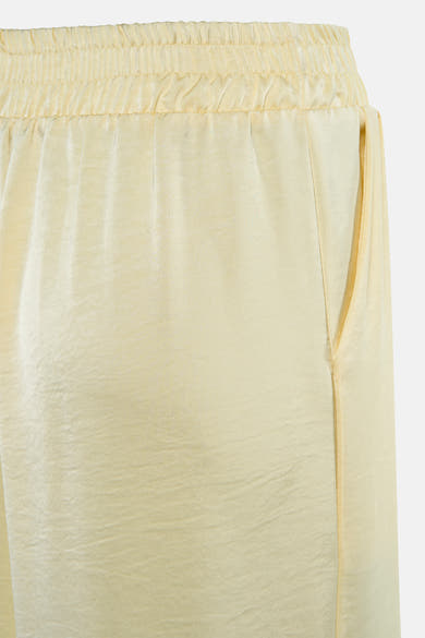 Pantalon jaune pour femme de Terra di Siena, avec taille élastique et texture soyeuse.