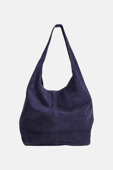 Navy blue suede shoulder bag with soft texture and slouchy design, front view