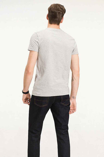 Grey short-sleeve t-shirt back view on model wearing dark jeans, plain heathered fabric, relaxed fit