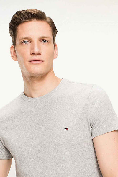 Grey heather short-sleeve t-shirt by Tommy Hilfiger with small chest logo, worn by model in front view