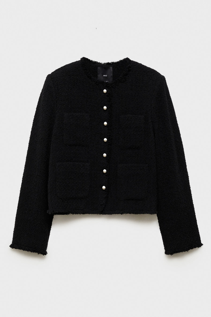 Zwarte tweed gilet van MANGO, met opgestikte zakken en parelmoeren knopen.