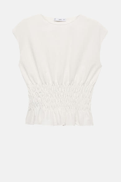 Wit mouwloos topje van MANGO, met een gerimpelde taille en een licht uitlopende zoom.