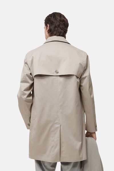 Manteau gris de MANGO, vue de dos avec détail de pli et col classique.