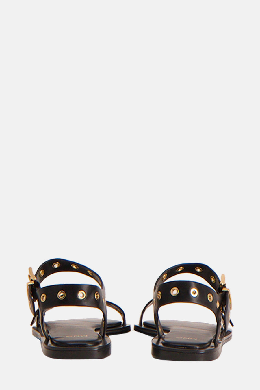 Sandales noires cloutées de MANGO, avec brides à boucle et semelles plates.