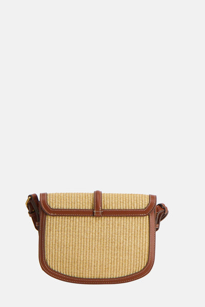 Sac à main brun en paille par MANGO, avec garniture en cuir marron et fermeture à rabat.