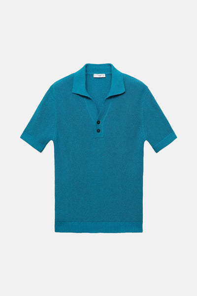 Polo turquoise à manches courtes de MANGO, en maille texturée avec deux boutons au col.
