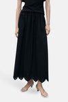 Zwarte lange rok van MANGO, met geplooide taille en broderie anglaise zoom.