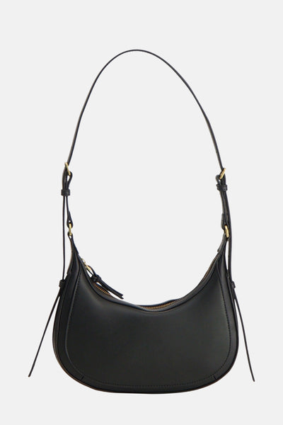 Sac à bandoulière noir de MANGO avec une bandoulière fine réglable et une fermeture éclair.

