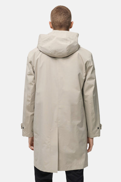 Manteau long beige de MANGO, avec capuche et coupe droite, vue de dos sur fond neutre.