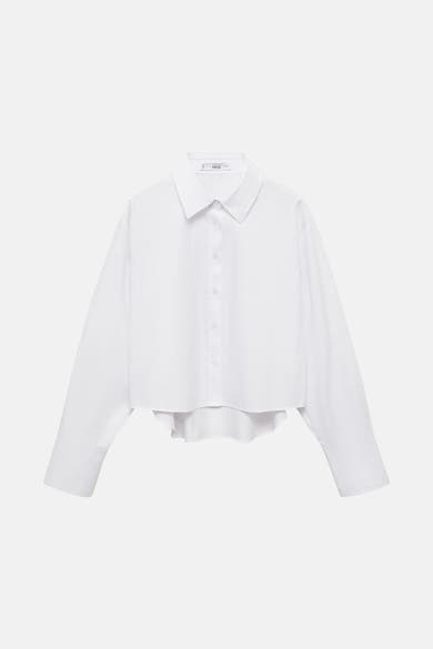Wit overhemd met lange mouwen van MANGO, korte pasvorm met afgeronde zoom en knoopdetails.