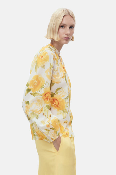 Multikleurige blouse met lange mouwen van MANGO, met gele bloemenprint en koordkraag.