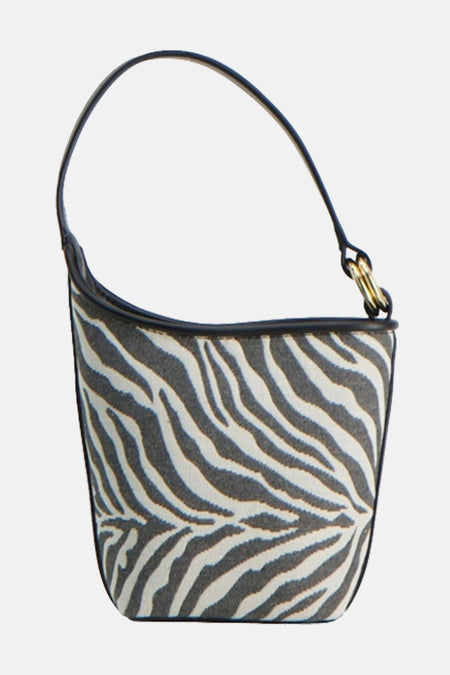 Zwarte schoudertas van MANGO met zebraprint, stijve handgreep en zwarte leren afwerkingen.