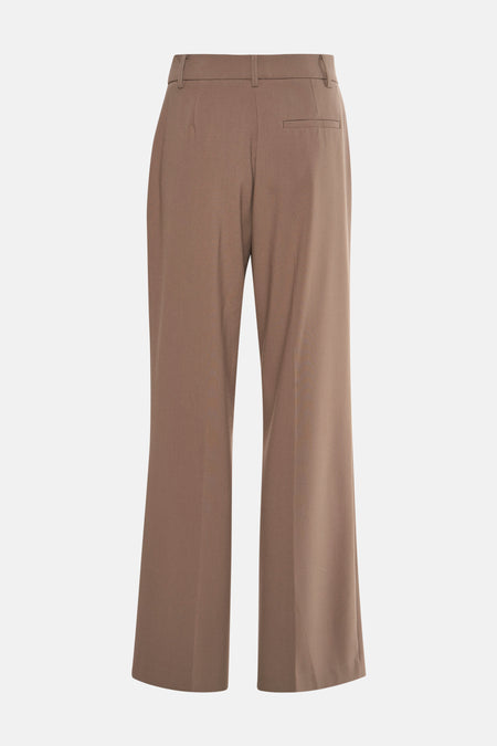Bruine broek van MANGO, met een paspelzak achter en een losse pasvorm.