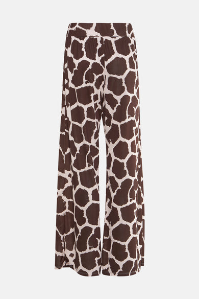 Pantalon marron à motif girafe par Terra di Siena, coupe ample et taille élastique.
