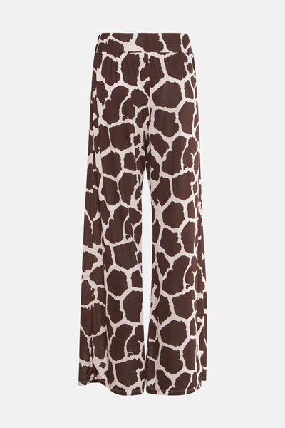 Pantalon marron à motif girafe par Terra di Siena, coupe ample et taille élastique.