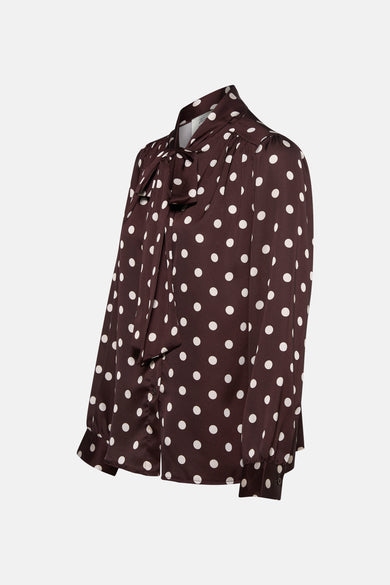 Bruine blouse met lange mouwen van Terra di Siena, met witte stippen en een decoratieve strik.