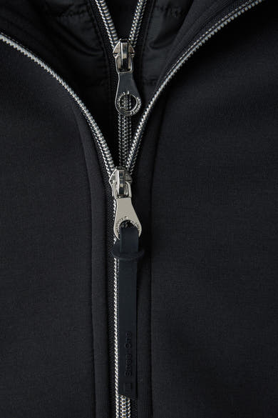 Kort blauw jack van Street One met zilverkleurige ritsen.