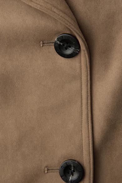 Veste courte cognac par Street One, avec une fermeture boutonnée apparente et une texture douce.