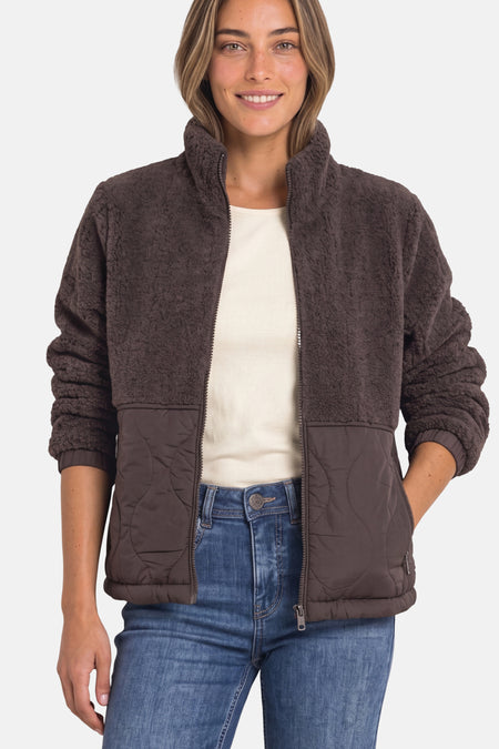 Brown shearling-style casual jacket by STREET ONE with quilted lower panel, full zip front, and ribbed cuffs, worn over cream top and blue jeans.