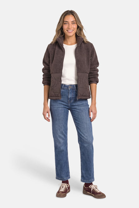Brown shearling-style casual jacket by STREET ONE, featuring quilted front panels and full-zip closure, worn with white top, blue jeans, and brown sneakers in lifestyle front view.