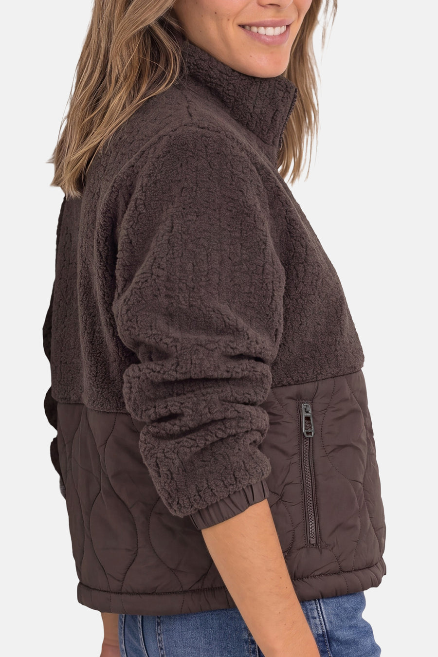 Brown plush and quilted casual jacket by STREET ONE, side view with high collar and zipper pocket, worn with blue jeans.