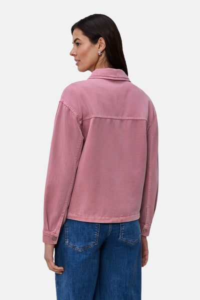 Gilet rose délavé de STREET ONE, détail du dos, porté sur un jean bleu.
