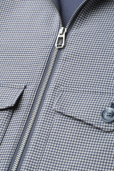 Blue houndstooth pattern casual jacket by Stree with silver zipper and flap pockets, close-up front view