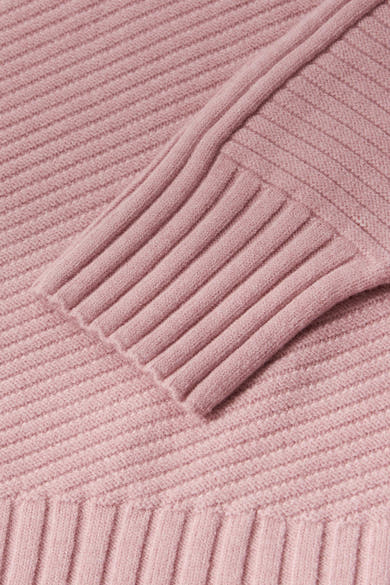 Pull col montant rose de STREET ONE avec une texture côtelée et une maille douce.

