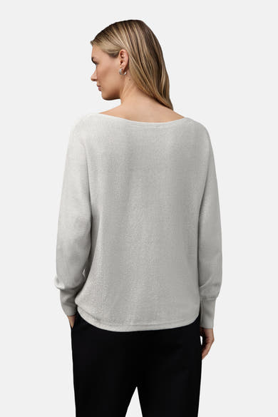 Top uni à manches longues argenté de Street One, vu de dos, porté avec un pantalon noir.
