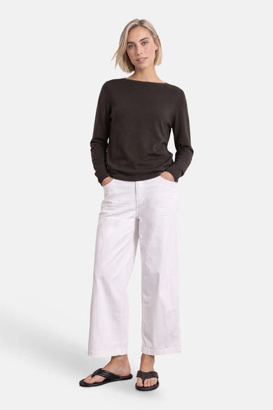 Brown round-neck sweater by STREET ONE, soft knit with ribbed cuffs, worn with white wide-leg pants and black sandals, front view.