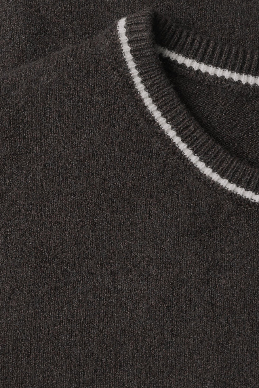 Brown crewneck sweater by STREET ONE with white ribbed trim, close-up view showing textured knit fabric.