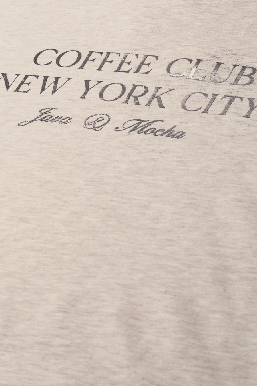 Beige O-neck sweatshirt with vintage-style "Coffee Club New York City" text print, soft heathered texture, close-up view