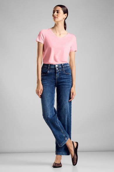 T-shirt à manches courtes pêche de STREET ONE, porté avec un jean taille haute et des chaussures plates noires.