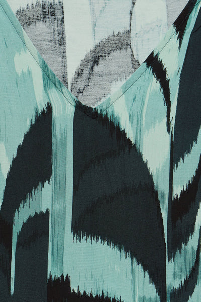 Groen mouwloos topje van STREET ONE met een grafische print in groentinten.